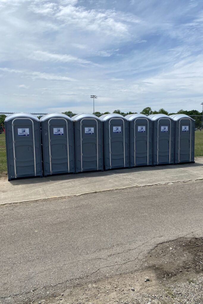 A lineup of standard portable toilets yb Toilets and Co.